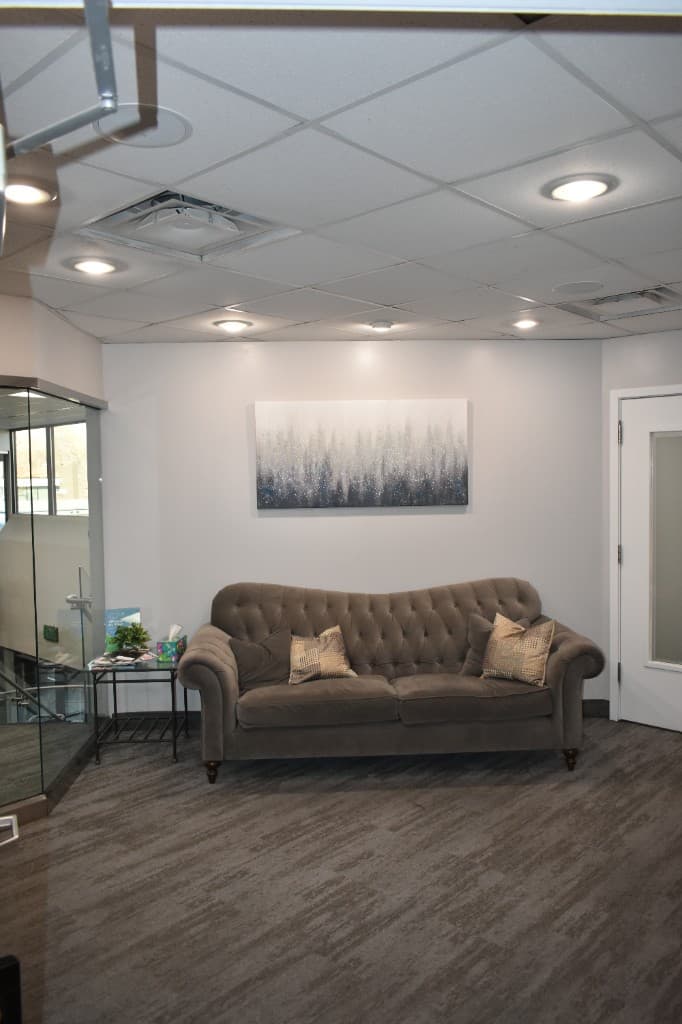 Murray office waiting room with comfortable seating and artwork